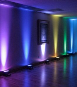 Multicolor LED uplights on wall