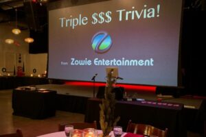 Triple $$$ Trivia dinner table setup